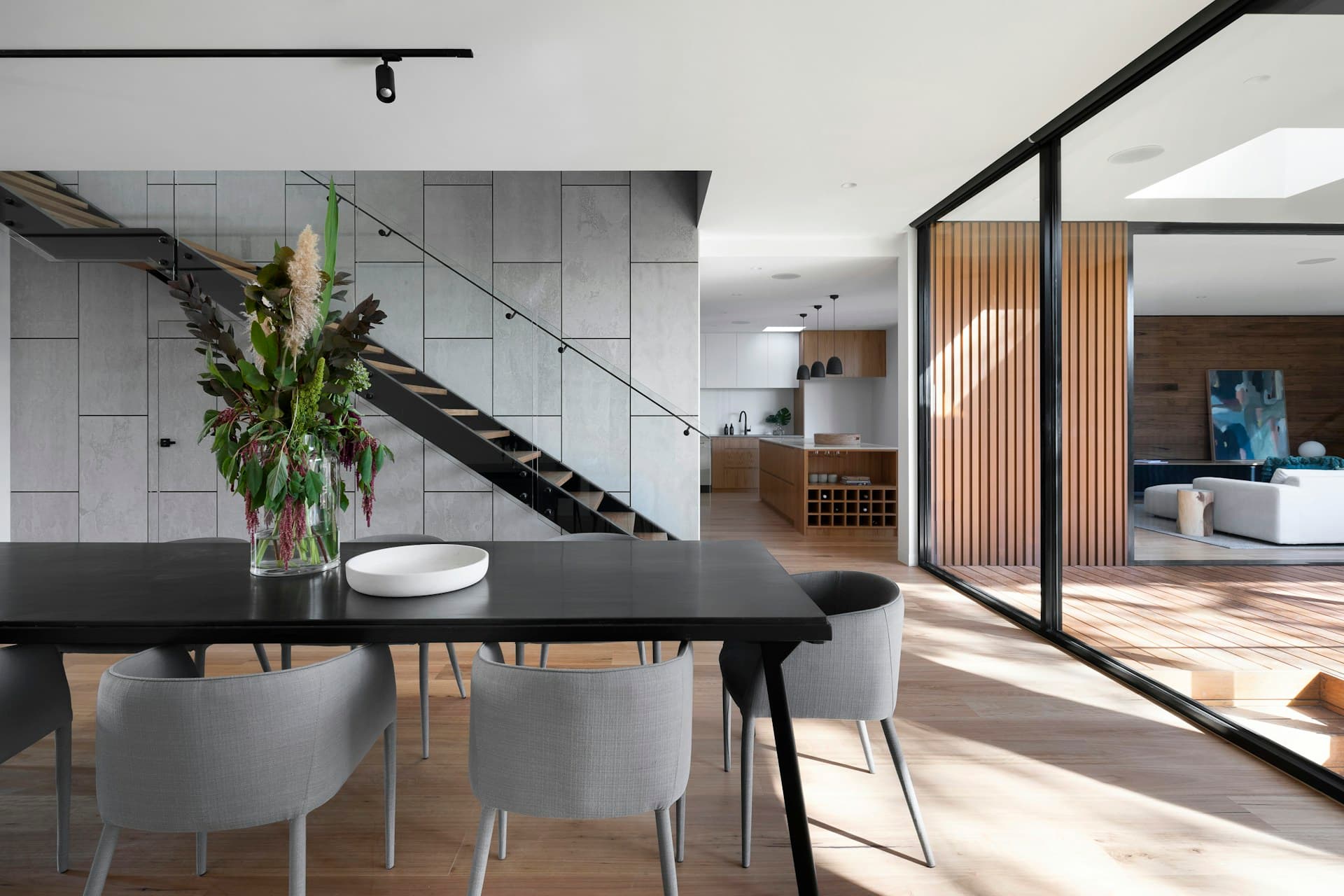 Illustrative contemporary residence framed by landscaped outdoor space